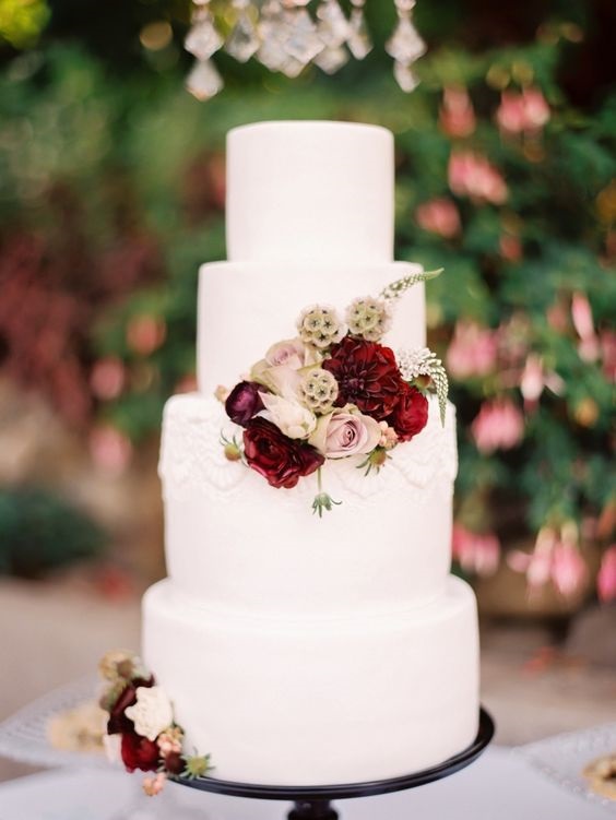 burgundy and blush wedding ceremony decoration